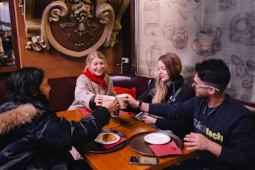 a group of people sitting at a table
